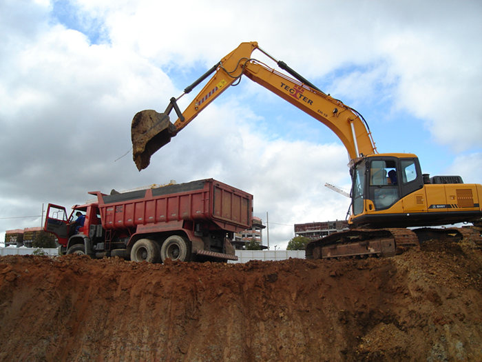 Hydraulic excavator SY215 in construction project.jpg