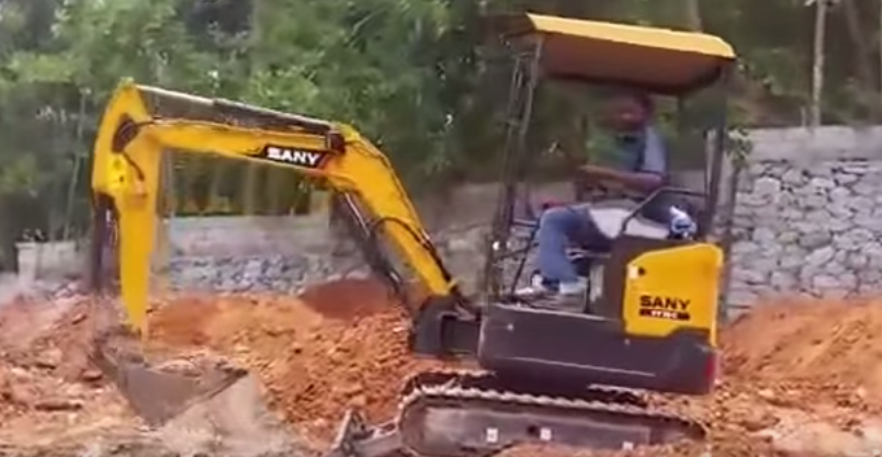 A SANY 1.6 ton mini excavator used in road construction